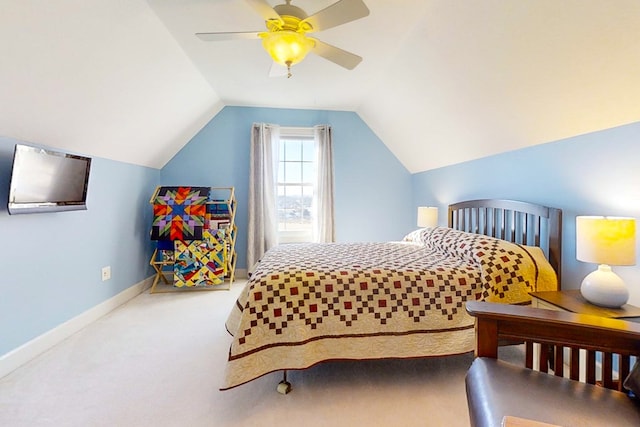 bedroom with lofted ceiling, carpet flooring, and ceiling fan