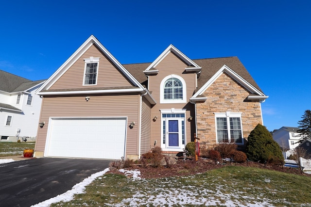 front facade with a garage