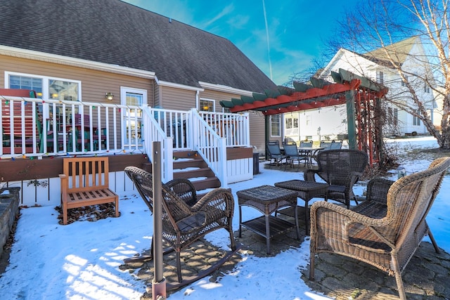 view of snow covered deck