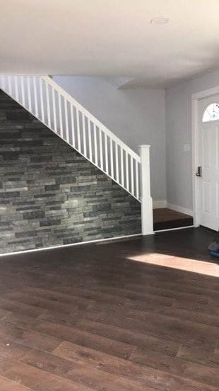 foyer with dark hardwood / wood-style flooring