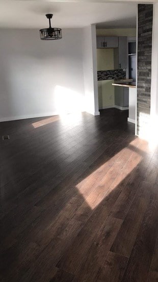 interior space with dark hardwood / wood-style flooring