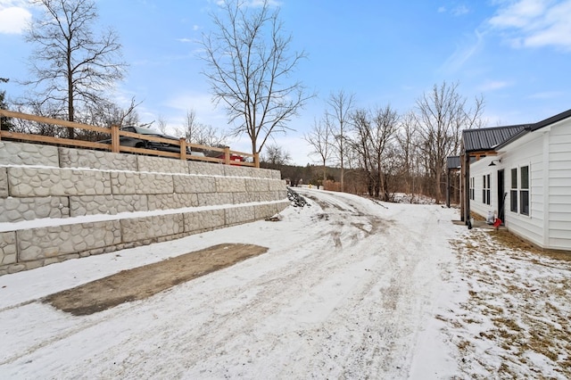 view of yard covered in snow