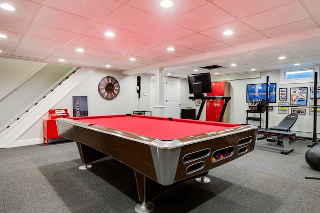 recreation room with dark carpet