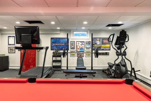 exercise room with pool table and baseboard heating