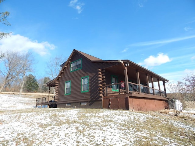 view of snow covered property