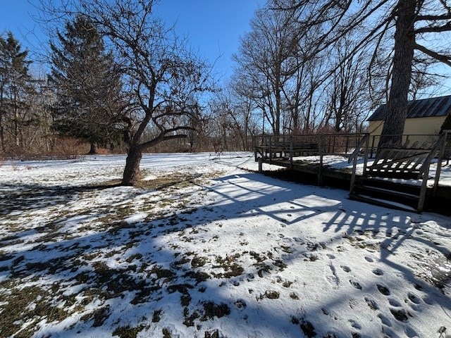 view of yard covered in snow