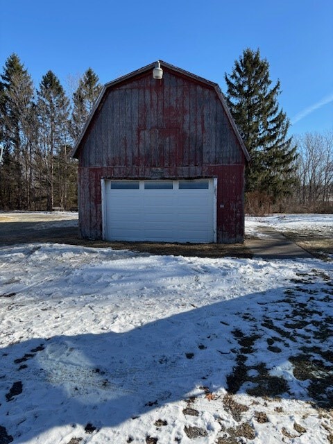 view of snow covered garage