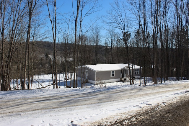 view of snow covered property