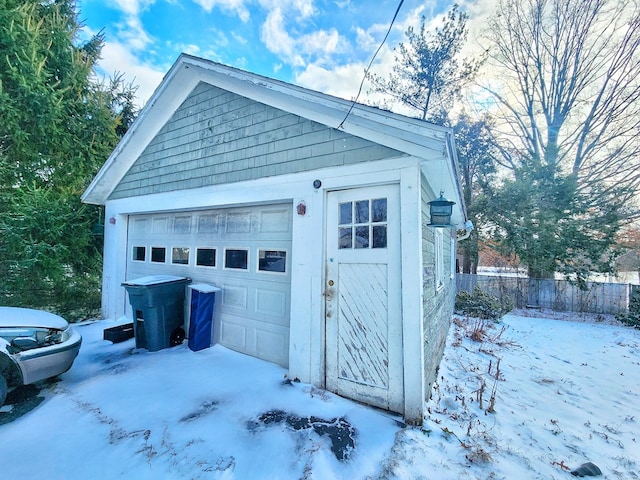 view of snow covered garage