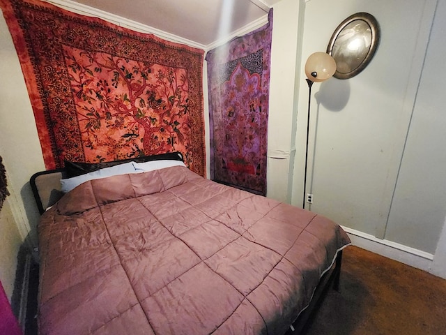 bedroom with ornamental molding