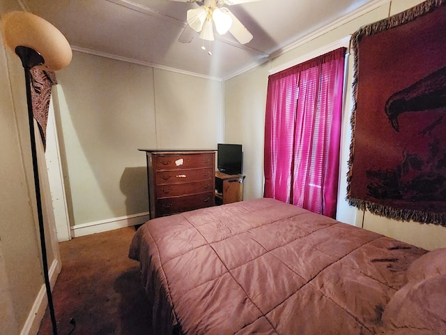 carpeted bedroom featuring crown molding and ceiling fan