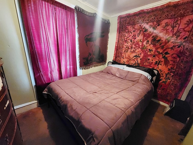 bedroom with ornamental molding