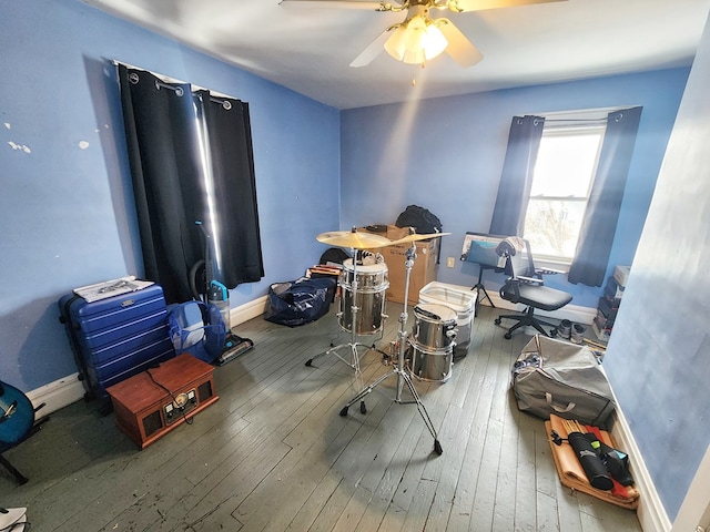 misc room featuring ceiling fan and hardwood / wood-style floors