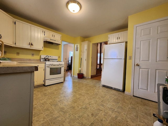 kitchen featuring white cabinets and white appliances