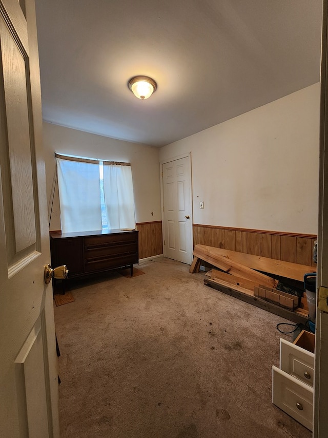 interior space featuring wooden walls