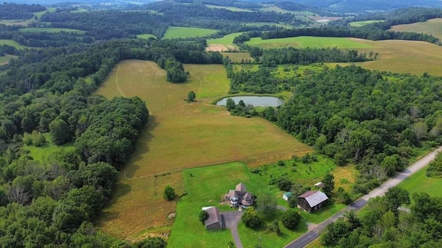 birds eye view of property featuring a rural view