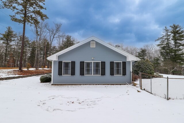 view of snow covered property