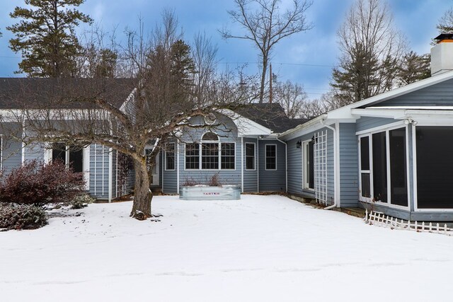 view of snow covered property