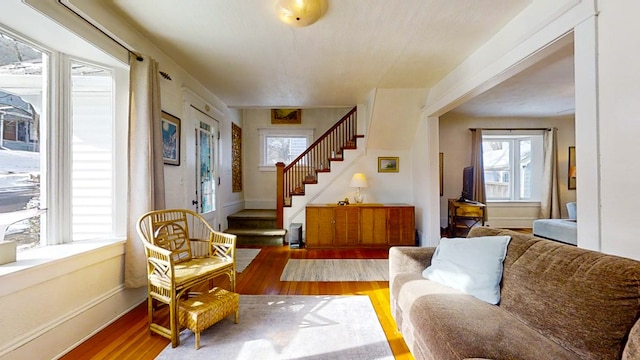 sitting room with wood-type flooring