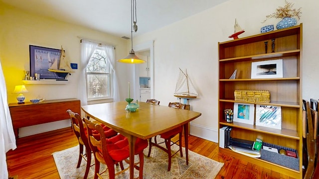 dining room featuring hardwood / wood-style flooring