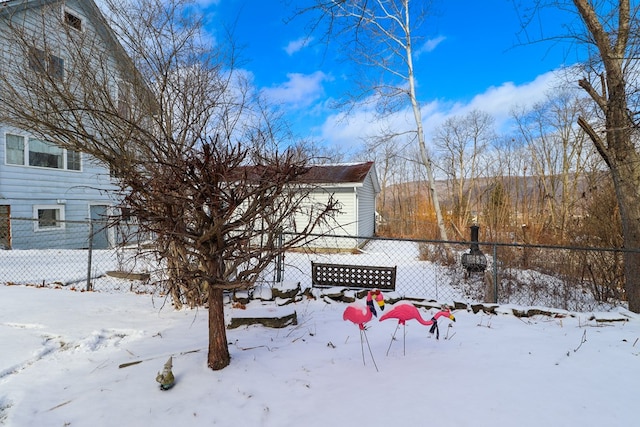 view of yard covered in snow