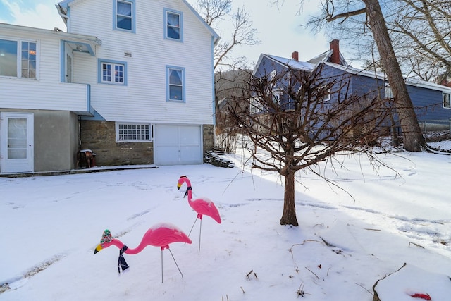 view of snow covered property