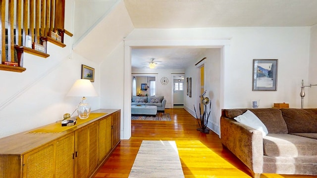 corridor with wood-type flooring