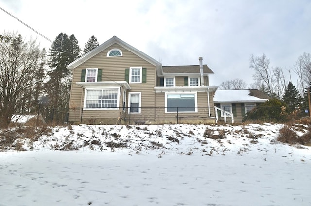 view of snow covered property