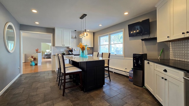 dining space featuring a baseboard radiator