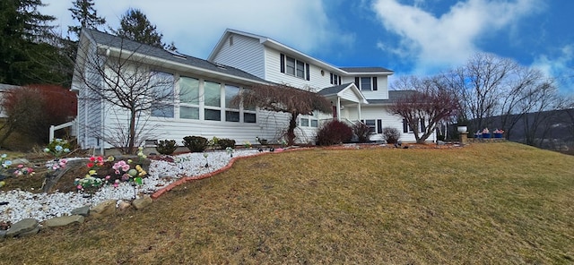 exterior space featuring a front lawn