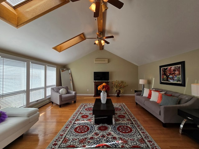 living room featuring lofted ceiling with skylight, a wall mounted air conditioner, a baseboard radiator, ceiling fan, and light hardwood / wood-style floors