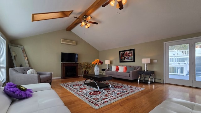 living room featuring hardwood / wood-style floors, a wall mounted air conditioner, lofted ceiling with beams, and ceiling fan