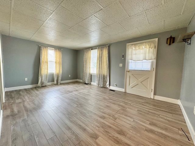 entryway with light hardwood / wood-style floors