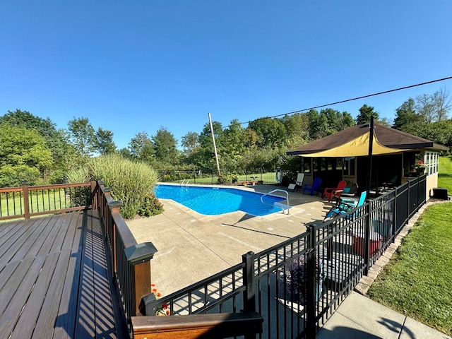 view of pool featuring a patio