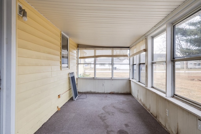 unfurnished sunroom featuring a healthy amount of sunlight