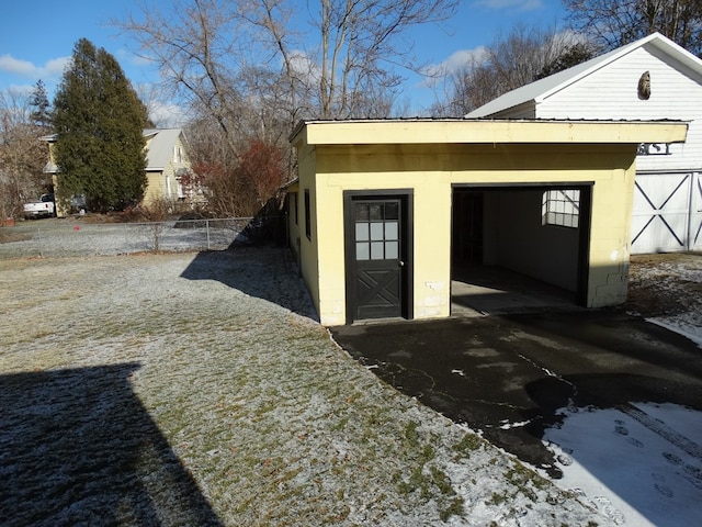 view of outbuilding with a garage