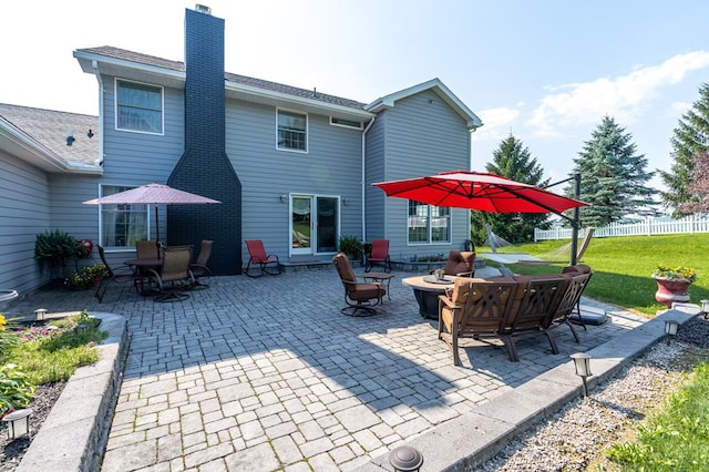 view of patio featuring an outdoor fire pit