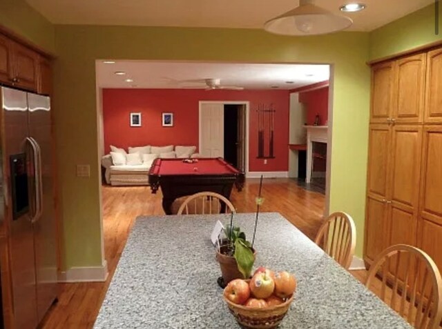 interior space featuring pool table and light hardwood / wood-style flooring