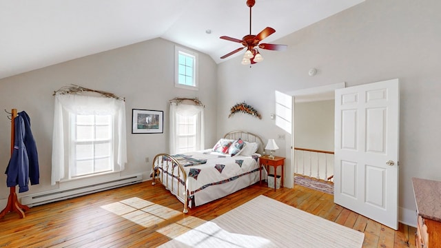 bedroom featuring ceiling fan, high vaulted ceiling, baseboard heating, and light hardwood / wood-style floors