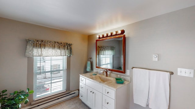 bathroom with vanity and a baseboard heating unit