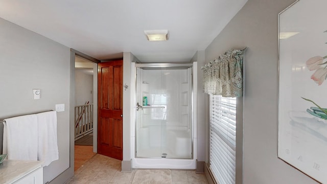 bathroom with an enclosed shower