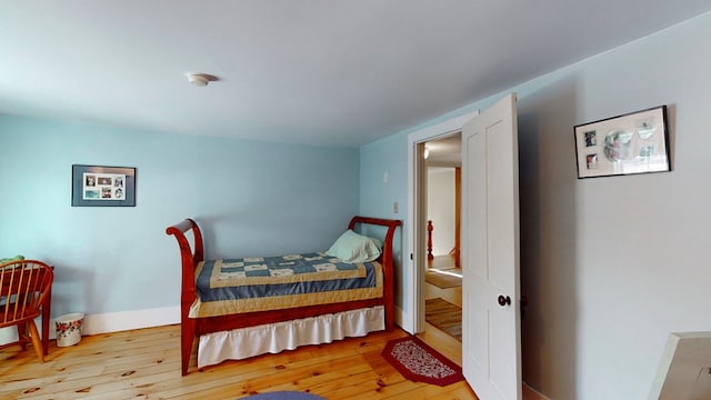 bedroom with light wood-type flooring