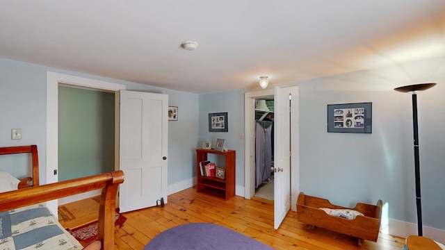 bedroom featuring light hardwood / wood-style floors