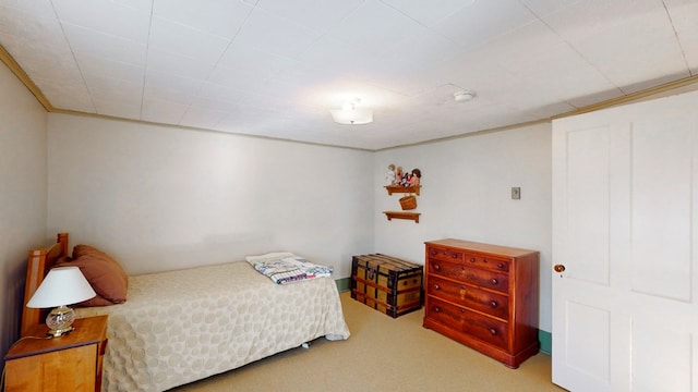 bedroom featuring light carpet