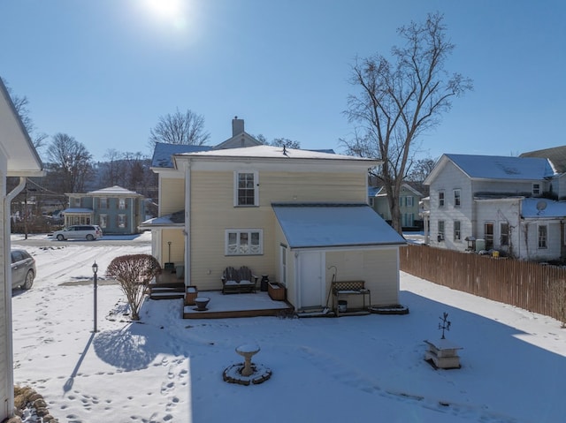 view of snow covered property