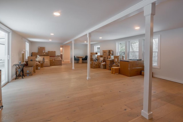 basement featuring light hardwood / wood-style floors