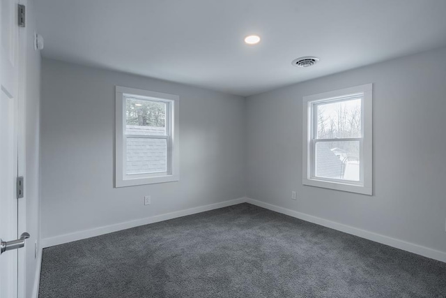 view of carpeted spare room