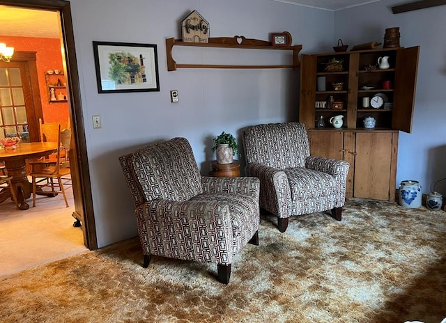 sitting room featuring carpet