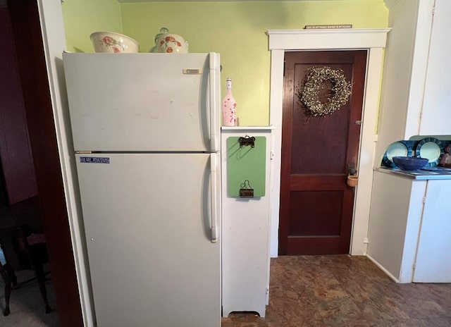 kitchen featuring white refrigerator