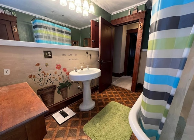 bathroom with ornamental molding, parquet flooring, and curtained shower